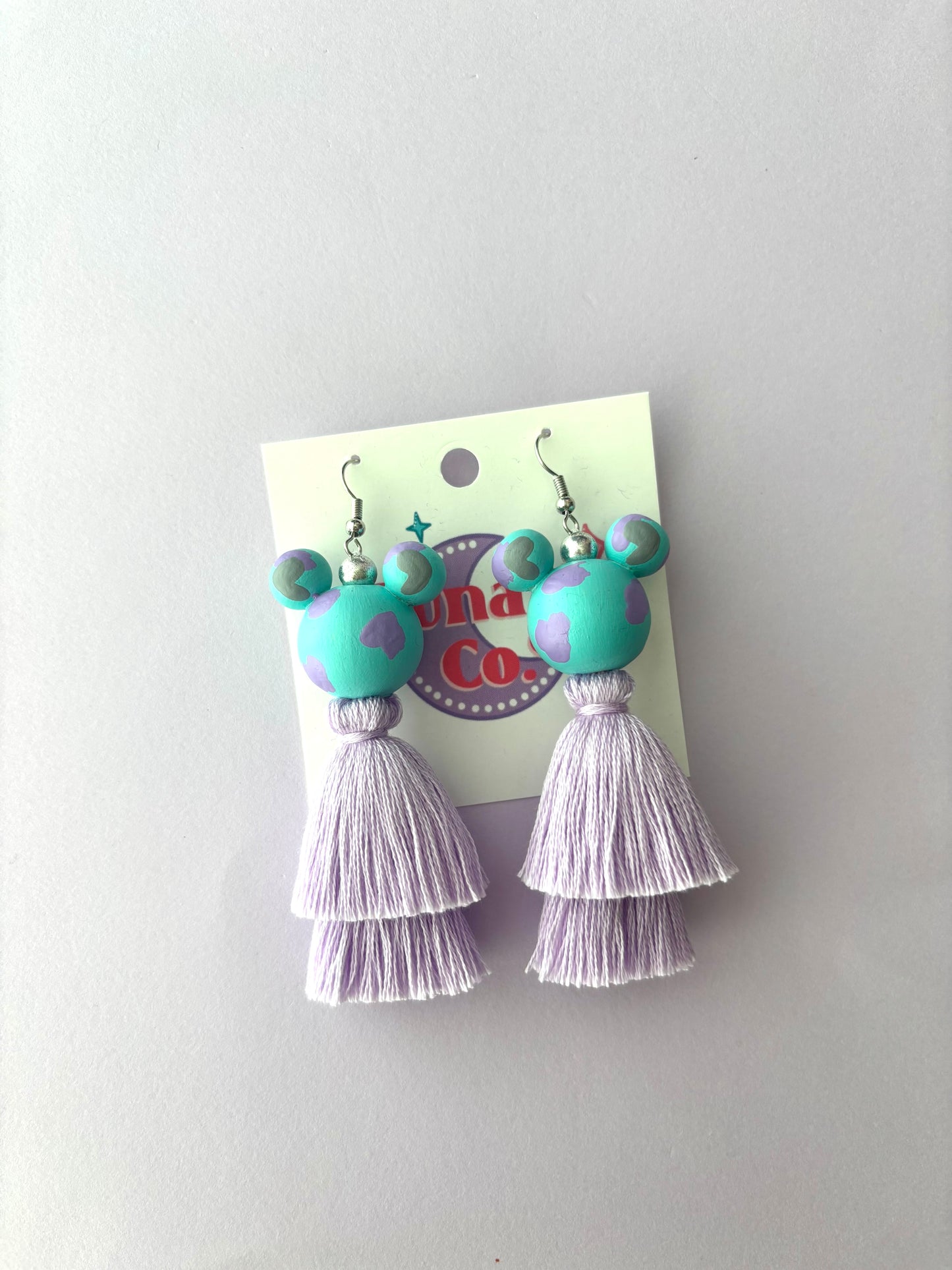 Blue Monster - Purple Tassels